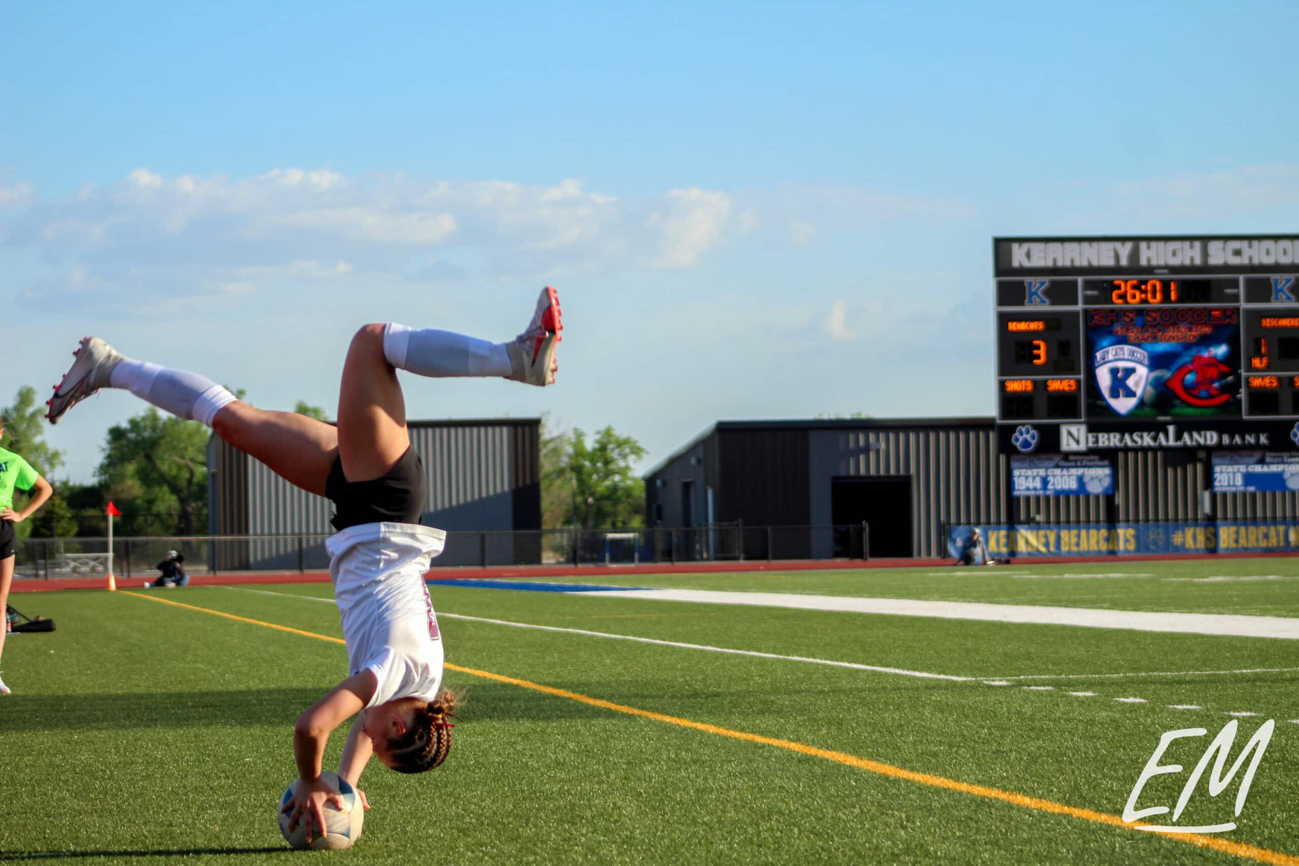 Alayna Kudron (Columbus) does a flip throw-in.