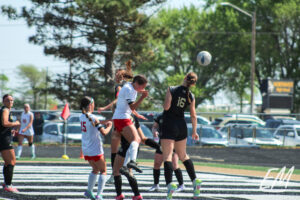 Ella Rogers (Elkhorn) heads in the game-winning goal.