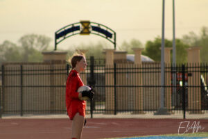 Emma Eilers (Lincoln East) stands in goal with the ball.
